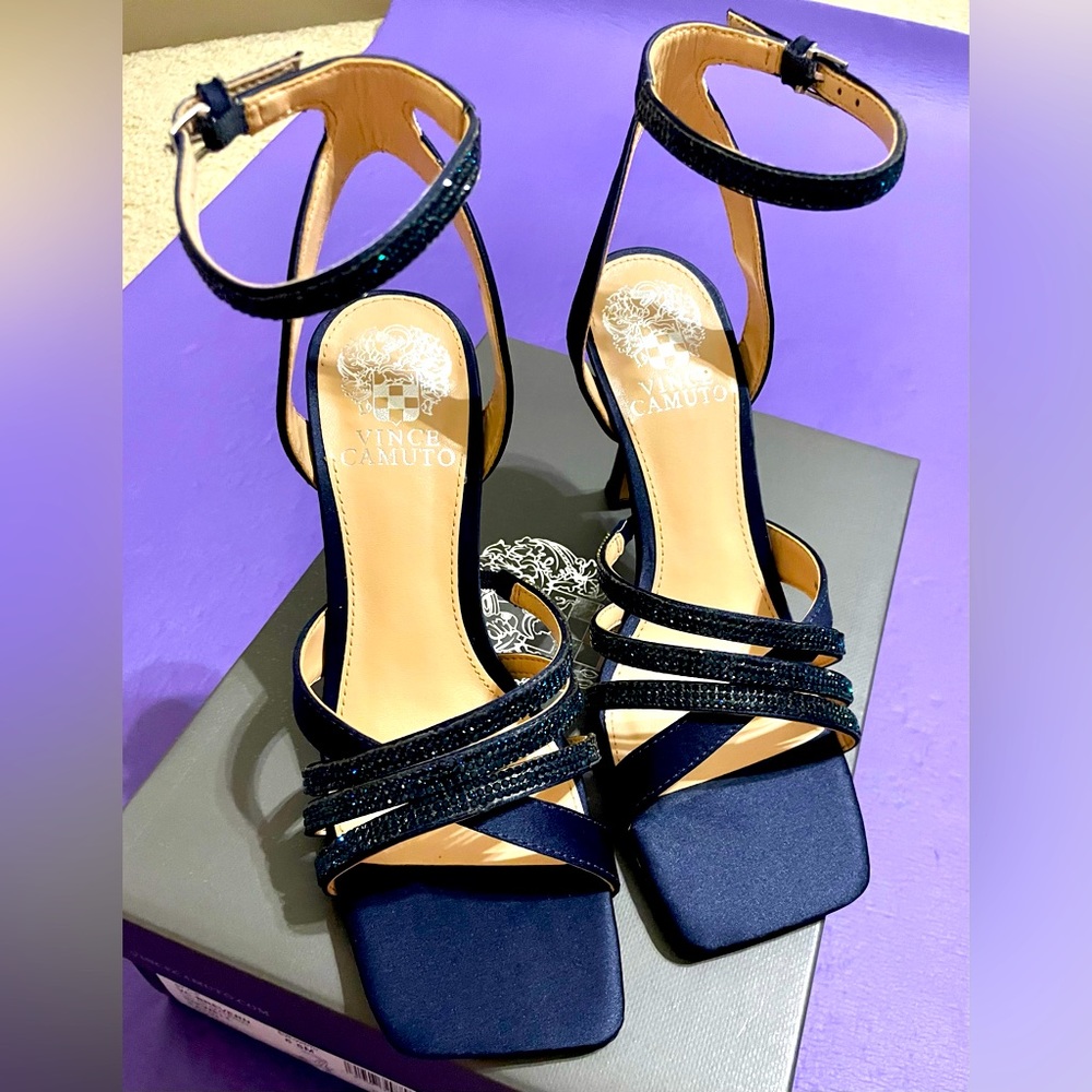 Vince Camuto square-toed sandals highlighted by crystal-encrusted straps.